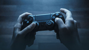 gaming controller held in hands